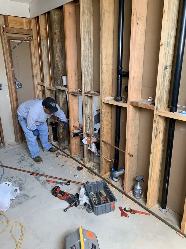 Commercial rough-in plumbing for Water Heater Replacement in De Pere